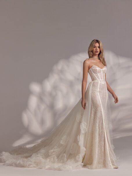 Fitted wedding dress with overskirt at WONA Bridal NYC